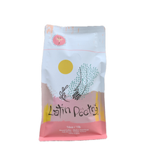 Load image into Gallery viewer, Discover the Rich and Smooth Flavor of Our Latin Poetry Medium Roast Coffee, Featuring Dominican Peaberry - AtilanoCoffee.Com